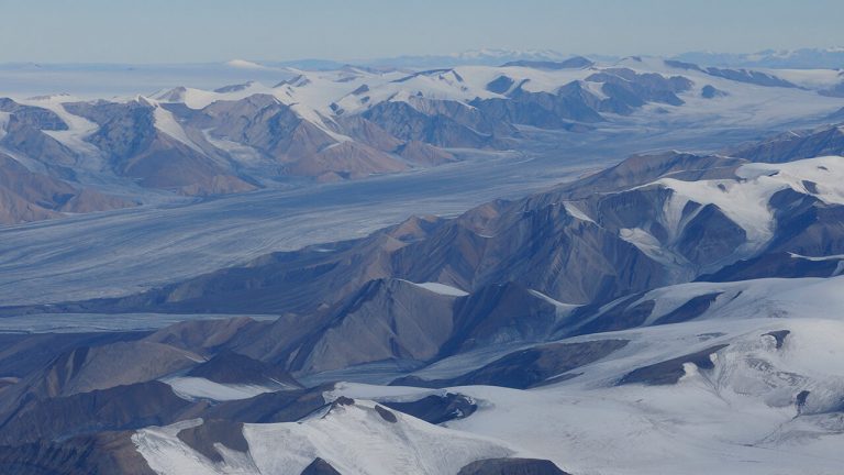 Aerial view of mountain range and glaciers en route to Eureka weather station, Ellesmere Island, Nunavut.